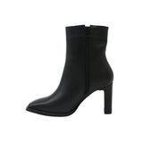 Indigo heeled ankle boots in black leather
