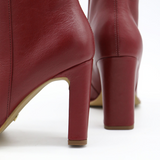 Indigo heeled ankle boots in ruby wine leather