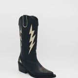 profile of kiss black leather cowboy boots with ivory contrast stitching details 