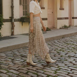 stivali_new_york_moonlight_western_cowboy_boots_in_off_white_leather_banner_ss25_resort_inspired_sny