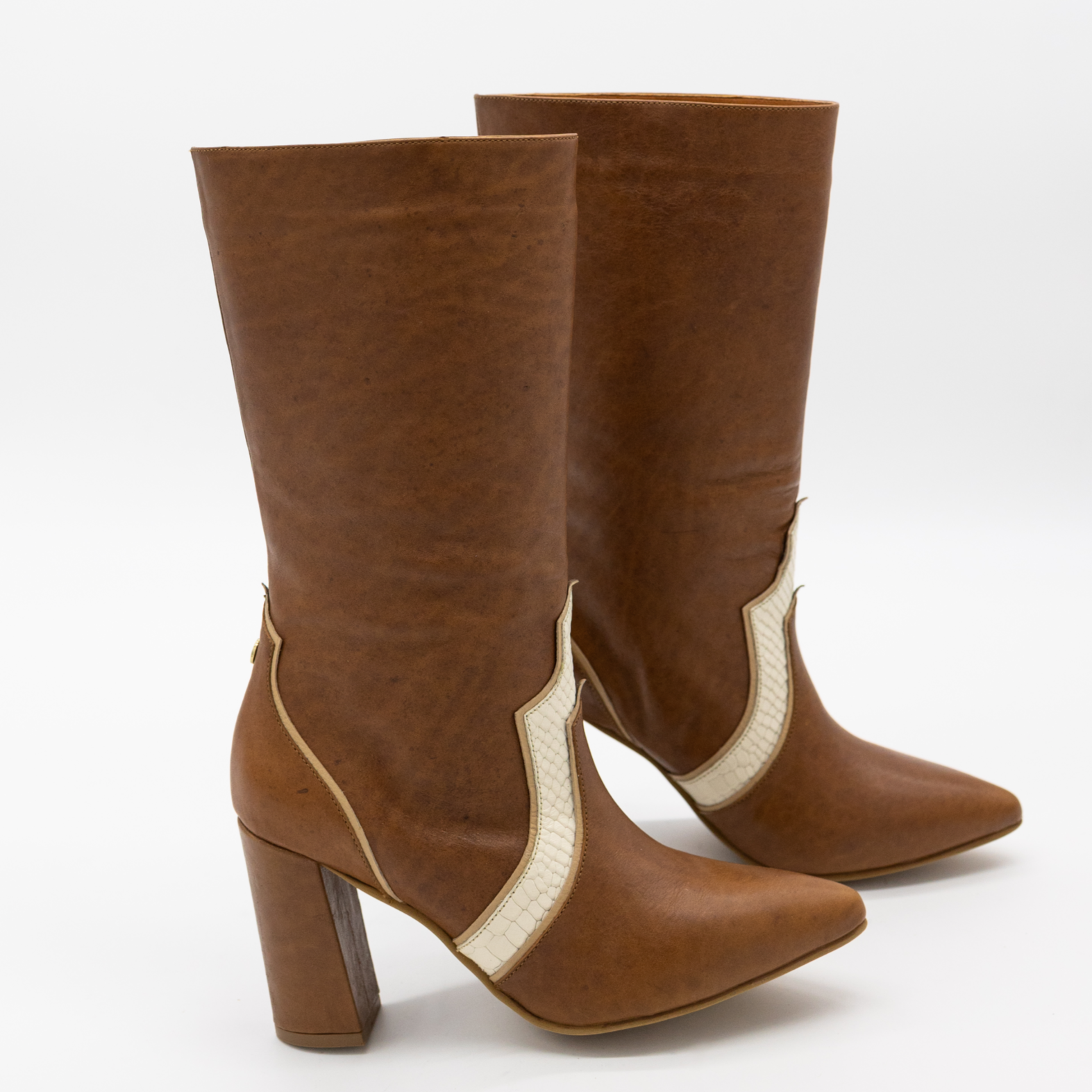 Handcrafted Leather Western Inspired Boots, Honey Tan Smooth Leather, Ivory White Embossed Leather, and Tan Arequipe Smooth Leather.